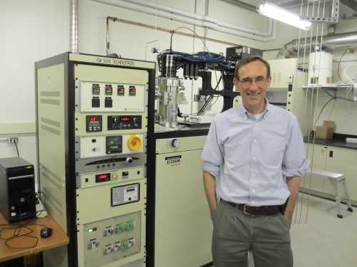 Not a black hole in sight: Raymond Laflamme in one of the IQC labs. The machine behind him makes diamonds for quantum computing experiments