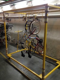 A pair of bicycles hung up in the tunnel next to the LHCb detector