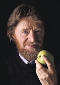 Photo of John Bell with apple.