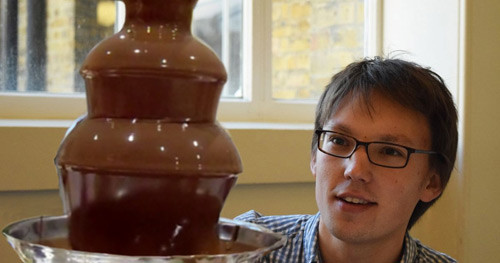 Picture of Adam Townsend with a chocolate fountain