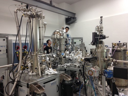 Researchers working on an angle-resolved photoemission spectrometer at the South University of Science and Technology of China