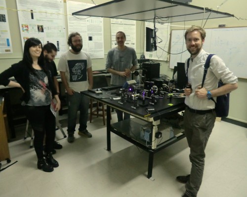 Photo of scientists in an optics lab