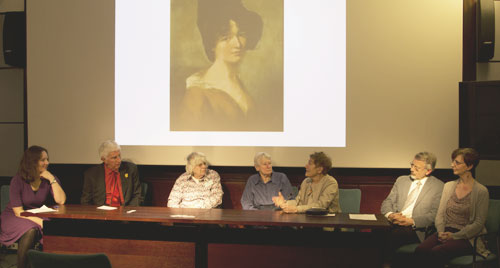 Photograph of a panel of speakers at the women in physics conference