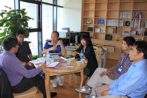 : Matin Durrani (left) in conversation with staff at the Beijing Comuptational Science Research Center on 15 June 2016