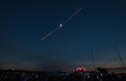 A composite image showing the progression of the total solar eclipse over Madras, Oregon 